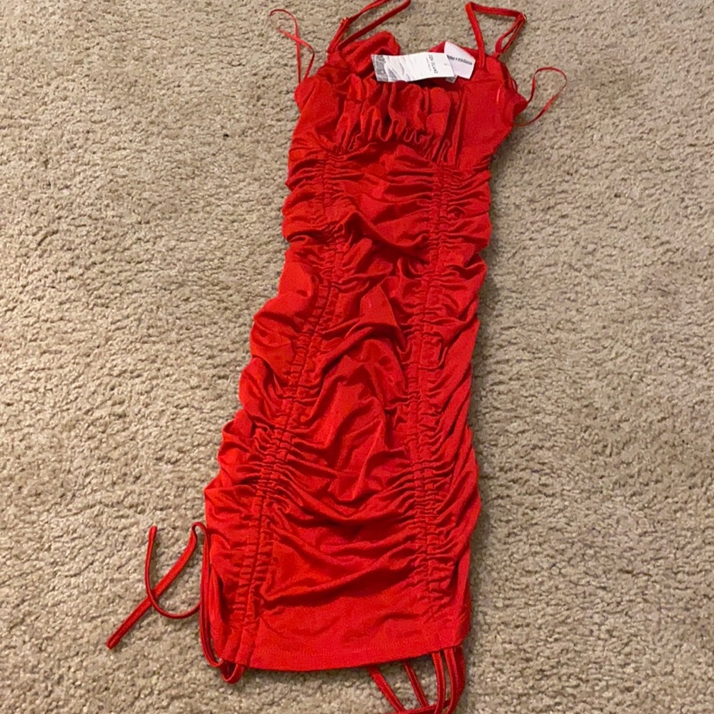 Selling this beautiful red dress new with tags! Never worn